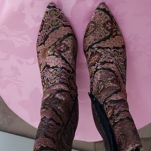 Size 10M mauve and multi color boot with 3 1/4 inch heel.